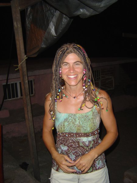 Lisa tries on the wig